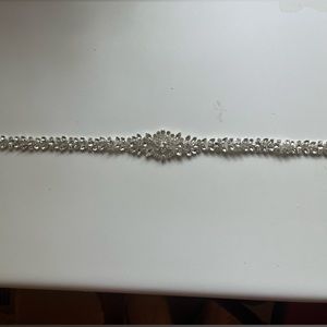 Brand New. Bridal rhinestone belt. New. Never worn. One size